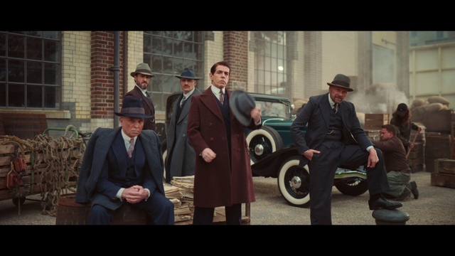 Video Reference: Tire, Trousers, Wheel, Vehicle, Motor vehicle, Car, Hat, Automotive design, Suit, Formal wear