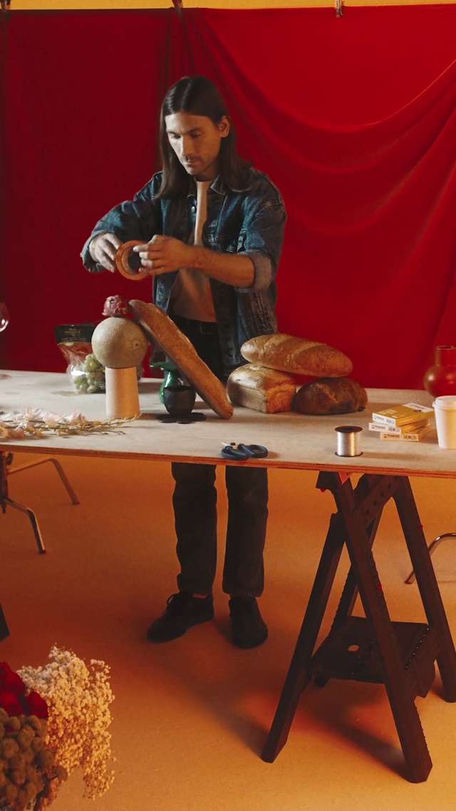 Video Reference: Table, Arm, Furniture, Human body, Orange, Stool, Yellow, Entertainment, Performing arts, Hat