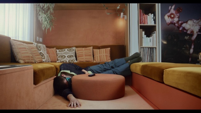 Video Reference: Brown, Property, Couch, Comfort, studio couch, Lighting, Wood, Interior design, Living room, Wall