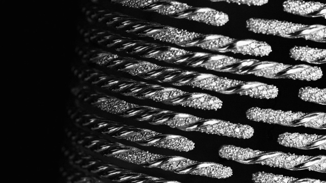 Video Reference: Automotive tire, Tread, Synthetic rubber, Bicycle tire, Tire, Font, Rim, Black-and-white, Automotive wheel system, Circle