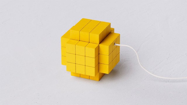 Video Reference: yellow cube, blocks, abstract object, geometric, white cable, plugged in, minimalist, studio, white background, 3d object, artificial, square blocks, modern art