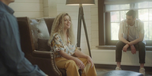 Video Reference: Joint, Arm, Comfort, Interior design, Window, Dress, Smile, Knee, Thigh, Event