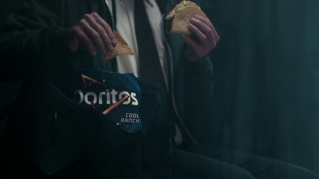 Video Reference: Hand, Sleeve, Gesture, Flash photography, Electric blue, T-shirt, Elbow, Font, Vehicle door, Event