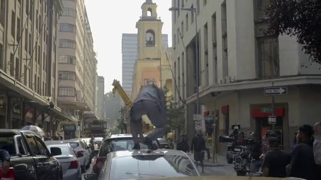 Video Reference: Building, Car, Vehicle, Tire, Sky, Wheel, Motor vehicle, Neighbourhood, Window, City