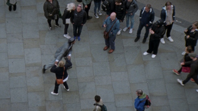 Video Reference: Performing arts, Entertainment, Event, Crowd, Fun, City, Pedestrian, Street, Leisure, Sitting