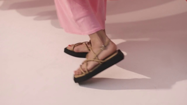 Video Reference: Dress, Human body, Flooring, Calf, Dancing shoe, Fashion design, Foot, Sandal, Basic pump, Knee