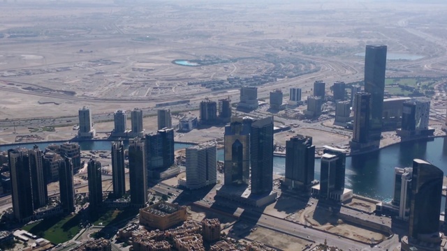 Video Reference: Skyscraper, Building, Daytime, Infrastructure, Sky, Tower block, Urban design, World, Condominium, Cityscape
