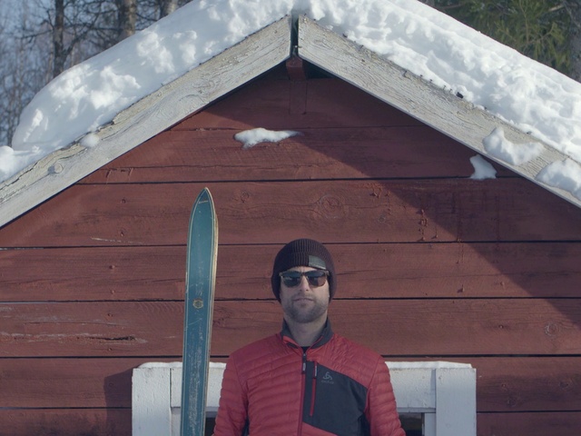 Video Reference: Outerwear, Wood, Building, Sunglasses, House, Siding, Tints and shades, Roof, Tree, Cottage