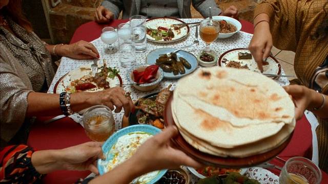 Video Reference: Food, Tableware, Dishware, Table, Watch, Plate, Chapati, Recipe, Chair, Ingredient