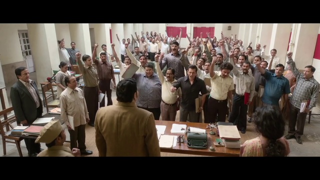 Video Reference: Table, Human, Coat, Suit, Desk, Chair, Crowd, Event, Music, Team