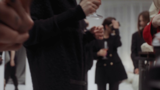 Video Reference: Sleeve, Gesture, Interaction, Formal wear, Blazer, Event, Street fashion, White-collar worker, Fun, Microphone