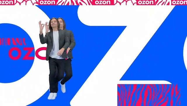 Video Reference: Blue, Azure, Sleeve, Gesture, Font, Red, Suit, Electric blue, Happy, Blazer