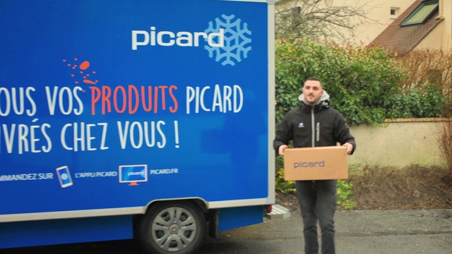 Video Reference: Wheel, Tire, Motor vehicle, Line, Plant, Asphalt, Electric blue, Event, Signage, Font