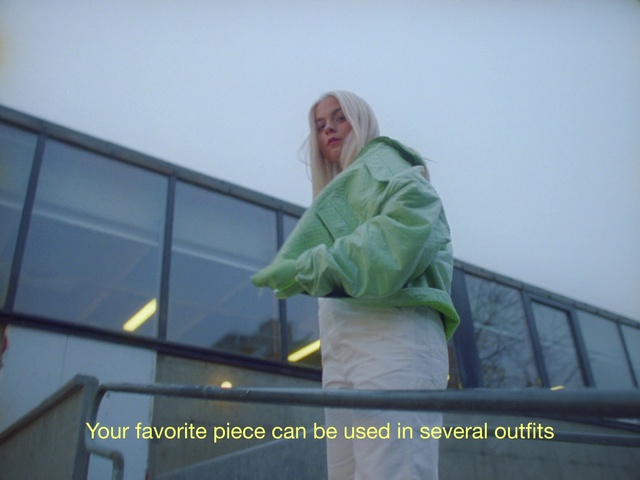 Video Reference: Sky, Sleeve, Workwear, Personal protective equipment, Facade, Sitting, Roof, Job, Advertising, Hoodie