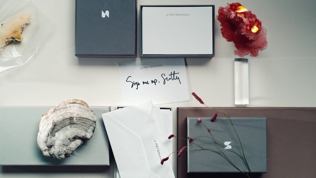Video Reference: White, Handwriting, Rectangle, Computer, Laptop, Gadget, Office supplies, Electronic device, Petal, Fashion accessory
