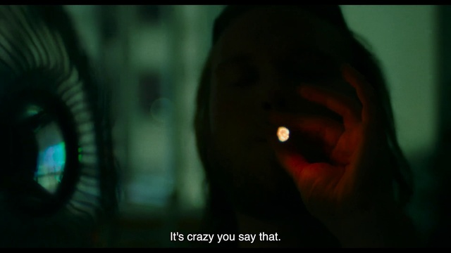 Video Reference: Eyebrow, Eyelash, Flash photography, Jaw, Iris, Gesture, Automotive lighting, Automotive tire, Circle, Darkness