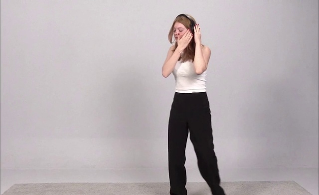 Video Reference: Flash photography, Neck, Sleeve, Undershirt, Knee, Waist, Gesture, Grey, Thigh, Sportswear