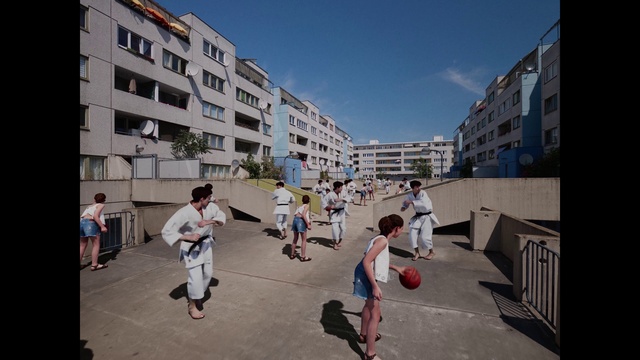 Video Reference: Shorts, Sky, Building, Window, Urban design, Neighbourhood, Condominium, Residential area, City, Metropolitan area