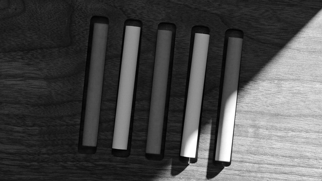Video Reference: Font, Wood, Office supplies, Tints and shades, Monochrome, Stationery, Monochrome photography, Still life photography