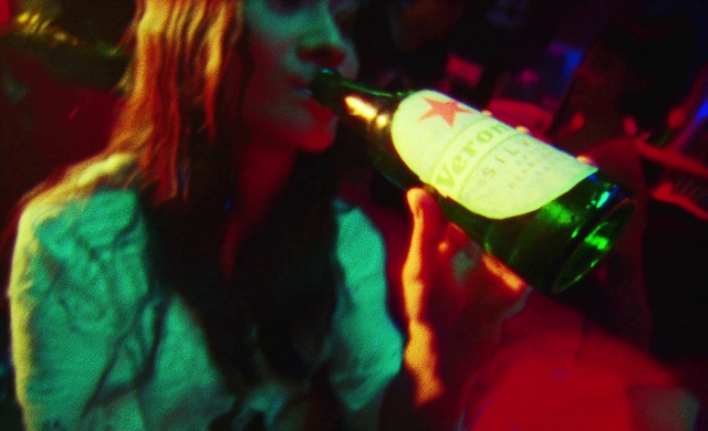 Video Reference: Bottle, Green, Microphone, Entertainment, Drink, Music, Magenta, Alcoholic beverage, Visual effect lighting, Drinkware